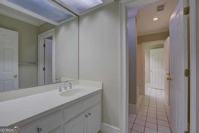 bathroom with recessed lighting, visible vents, ornamental molding, vanity, and tile patterned floors