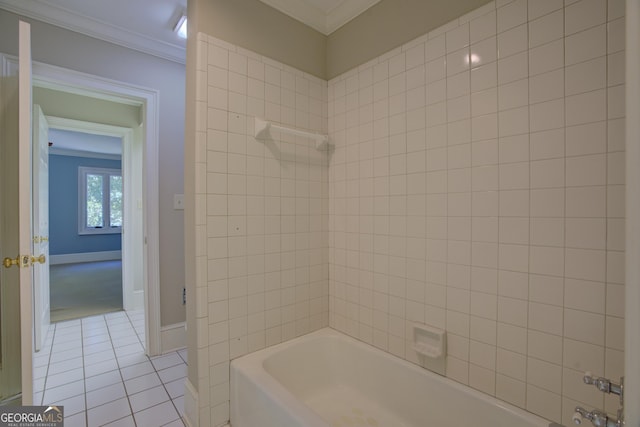 full bathroom with tile patterned flooring, ornamental molding, baseboards, and shower / bathtub combination