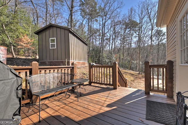 wooden deck with area for grilling