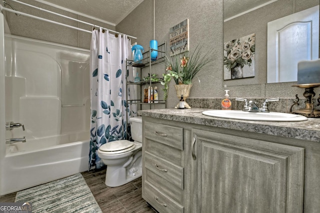 full bathroom featuring shower / bath combo, ornamental molding, vanity, wood-type flooring, and toilet