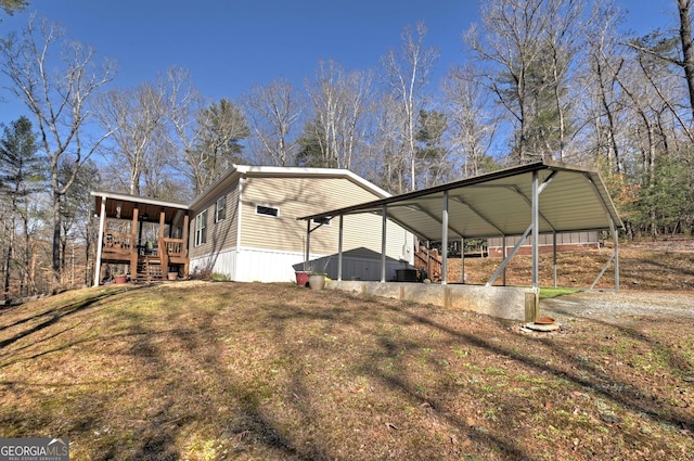 view of property exterior with a carport