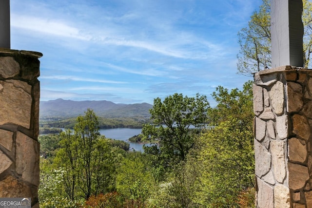 property view of mountains featuring a water view