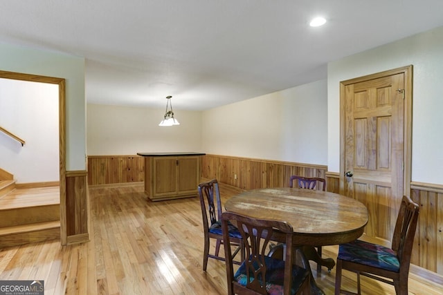 dining area with light hardwood / wood-style floors