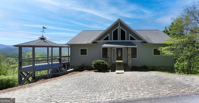 rear view of house with a gazebo