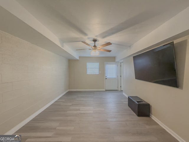 interior space featuring ceiling fan and light hardwood / wood-style flooring