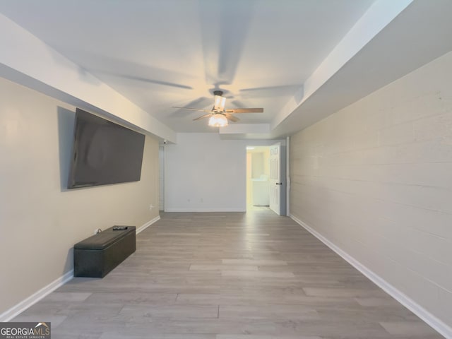 interior space with ceiling fan and light hardwood / wood-style flooring