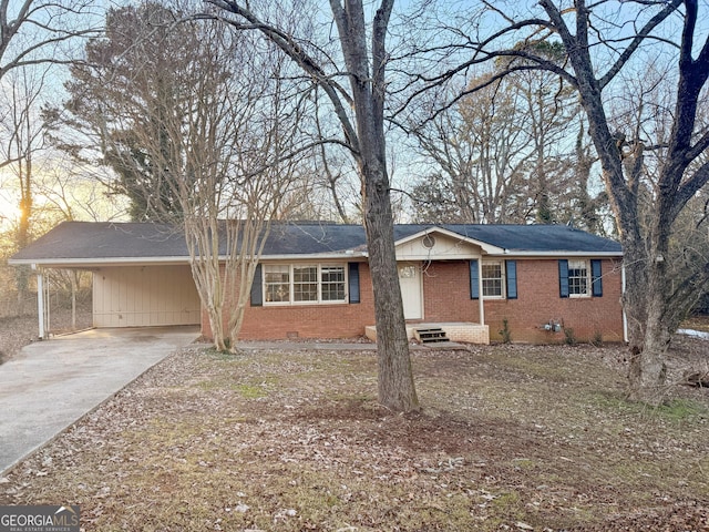 ranch-style home with a carport