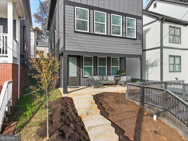 view of front of home with an outdoor living space