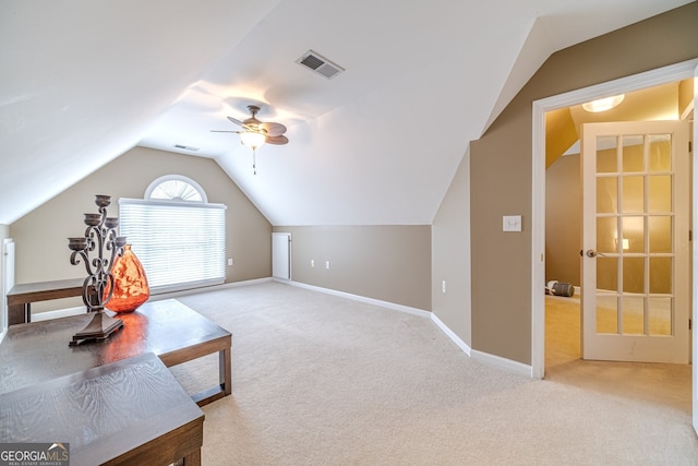 bonus room featuring ceiling fan, light colored carpet, and vaulted ceiling