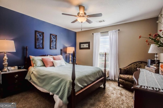 bedroom featuring ceiling fan and carpet