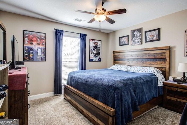 bedroom with visible vents, ceiling fan, baseboards, and carpet floors