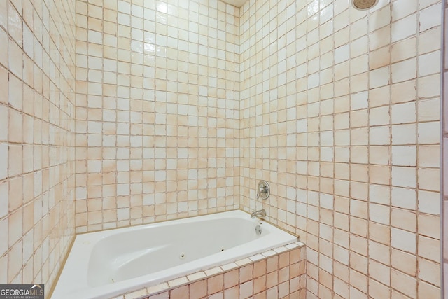 bathroom with tile walls