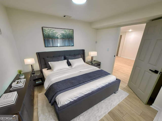 bedroom featuring light wood-type flooring