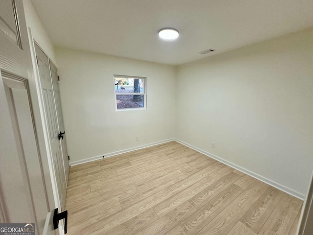 unfurnished bedroom featuring light hardwood / wood-style floors