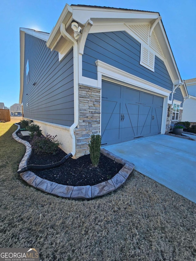 view of home's exterior featuring a garage