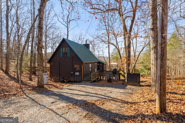 exterior space with a wooden deck