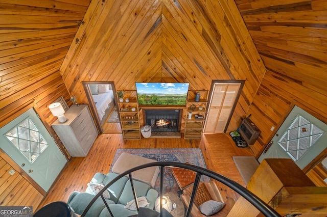 living room featuring wood walls