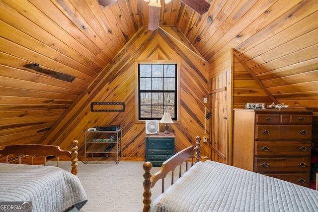 bedroom featuring wood walls, lofted ceiling, carpet floors, and wood ceiling