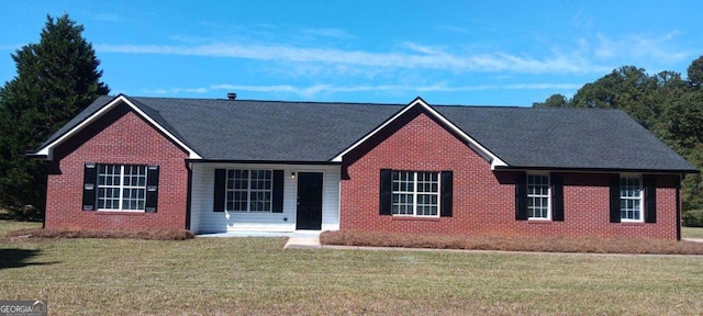 single story home with a front yard