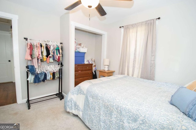 carpeted bedroom featuring ceiling fan