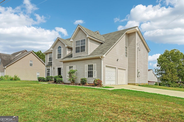 view of front of property featuring a front lawn and a garage