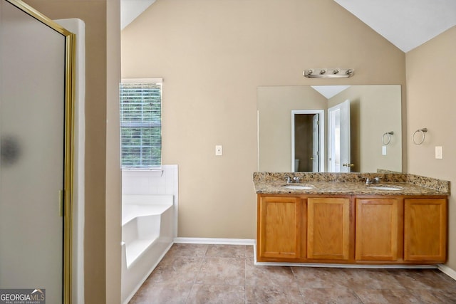 bathroom with tile patterned floors, vanity, separate shower and tub, and vaulted ceiling