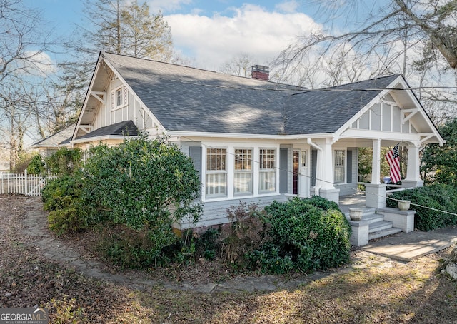 view of property exterior with a porch