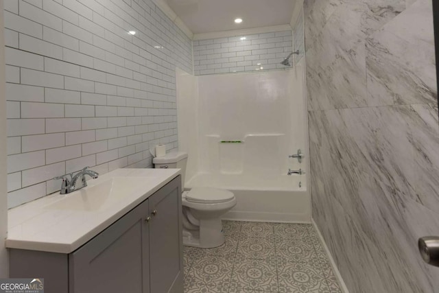 full bathroom featuring shower / bath combination, vanity, tile walls, tile patterned flooring, and toilet