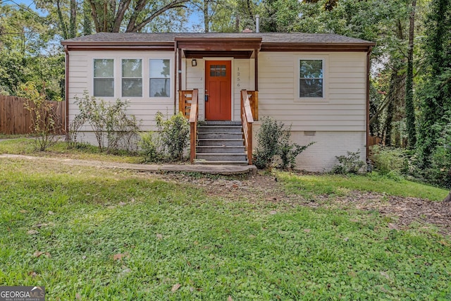 view of front facade with a front lawn