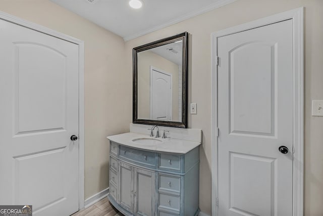 bathroom with vanity and wood-type flooring