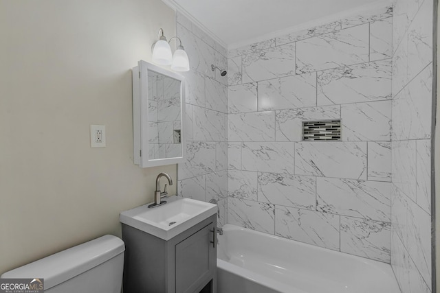 full bathroom featuring vanity, toilet, tiled shower / bath combo, and crown molding