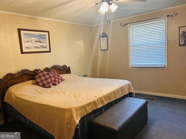 carpeted bedroom featuring ceiling fan and ornamental molding