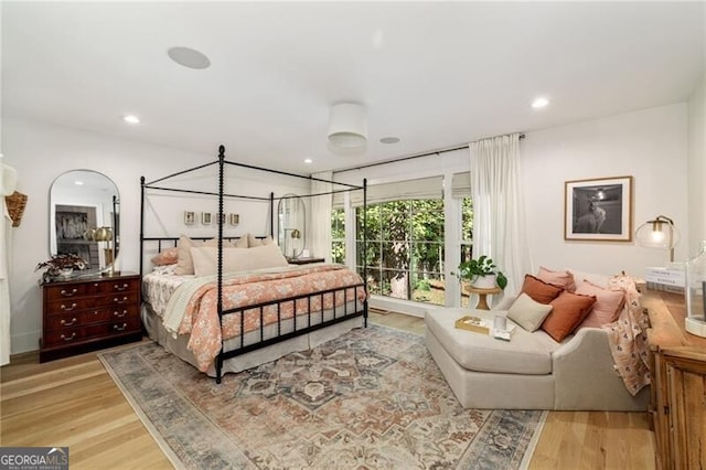 bedroom featuring light hardwood / wood-style floors