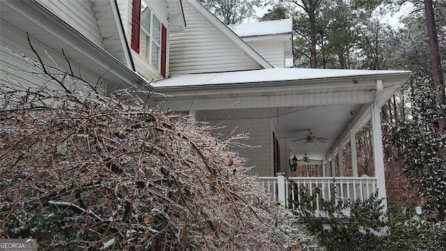 exterior details featuring ceiling fan