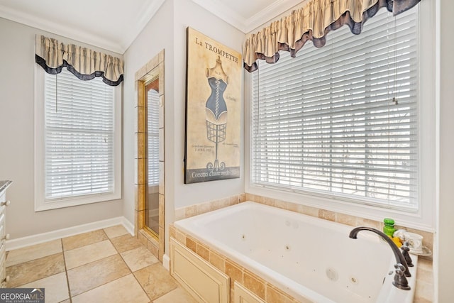 bathroom featuring crown molding, a shower with shower door, a tub with jets, and baseboards