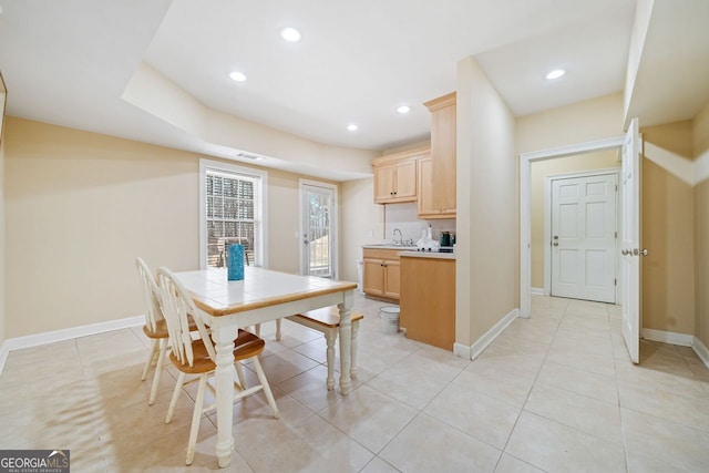 interior space featuring recessed lighting, visible vents, light countertops, baseboards, and light brown cabinets