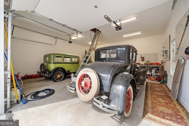 garage featuring a garage door opener