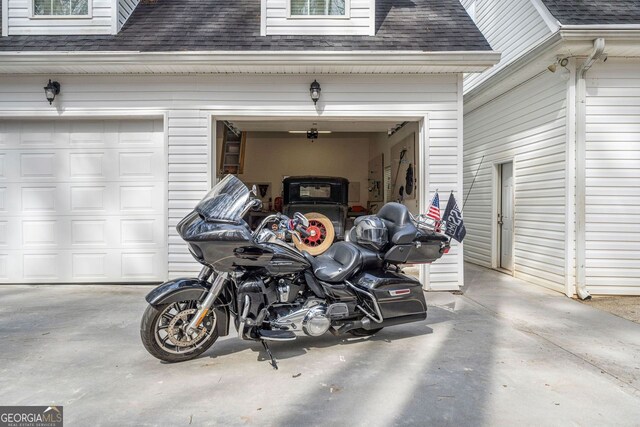 garage featuring driveway