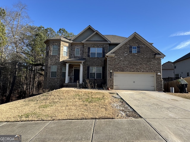 view of front of property with a garage