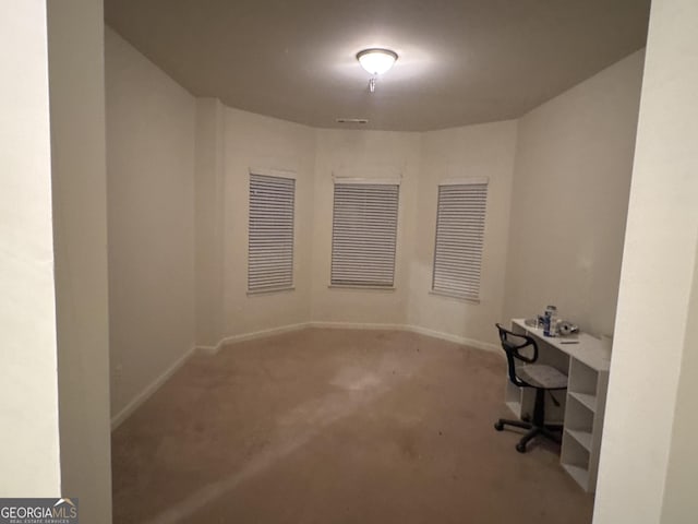 unfurnished office with carpet