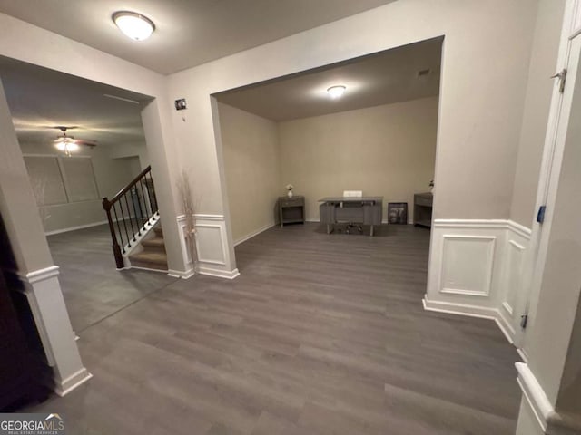 hallway featuring dark hardwood / wood-style flooring