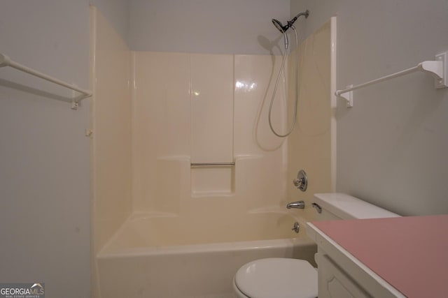 full bathroom featuring vanity, shower / bath combination, and toilet