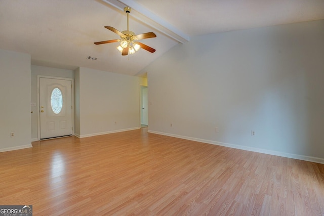 interior space featuring vaulted ceiling with beams, ceiling fan, and light wood-type flooring