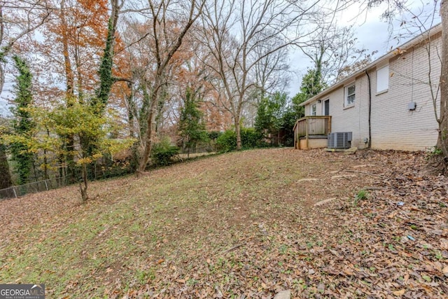 view of yard featuring central AC unit