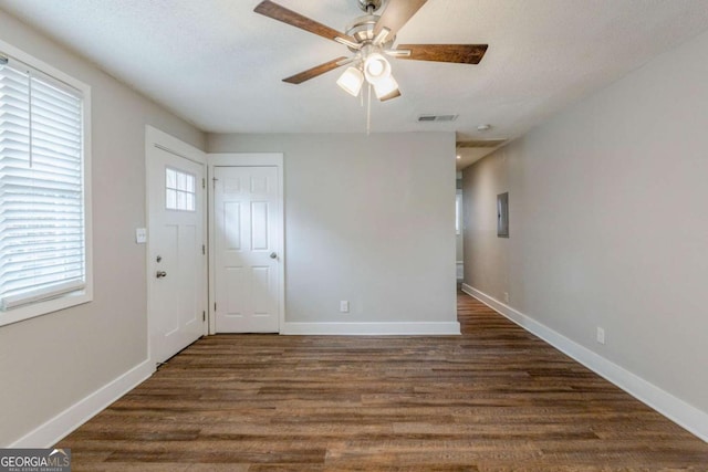 entryway with ceiling fan and dark hardwood / wood-style floors