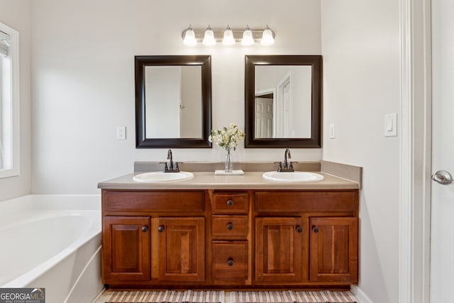 bathroom featuring a bathtub and vanity