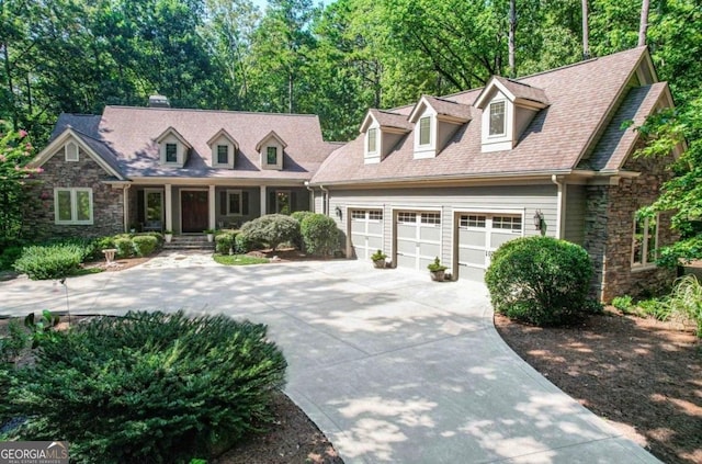 new england style home with a garage