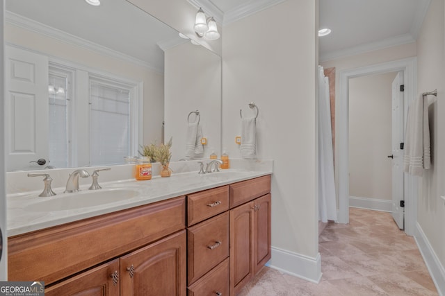 bathroom with vanity and ornamental molding