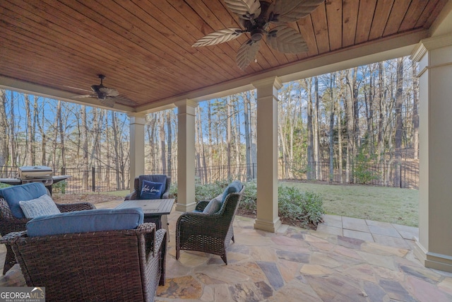 view of patio featuring ceiling fan