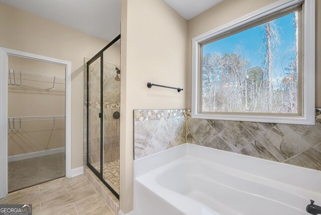 unfurnished bedroom with ceiling fan, light colored carpet, wooden ceiling, and ensuite bathroom